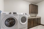 Convenient laundry room for longer stays 